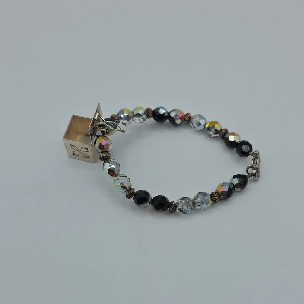 Elegant Black and Gold Charm Bracelet